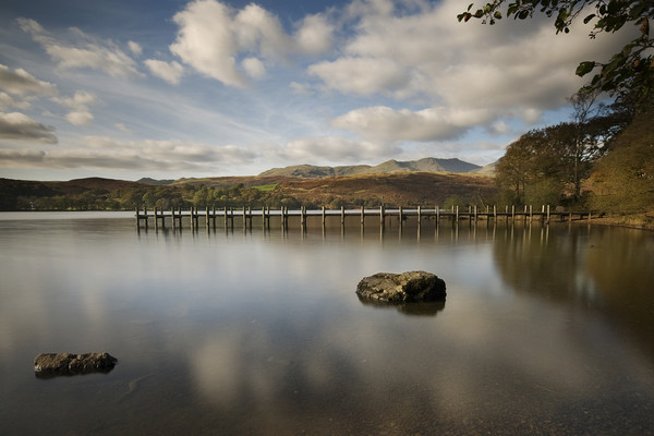jetty on Coniston water Picture Board by Eddie John