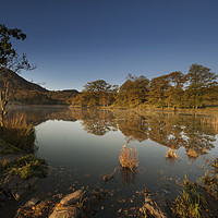 Buy canvas prints of Reflections on Rydal water on an autumn dawn by Eddie John