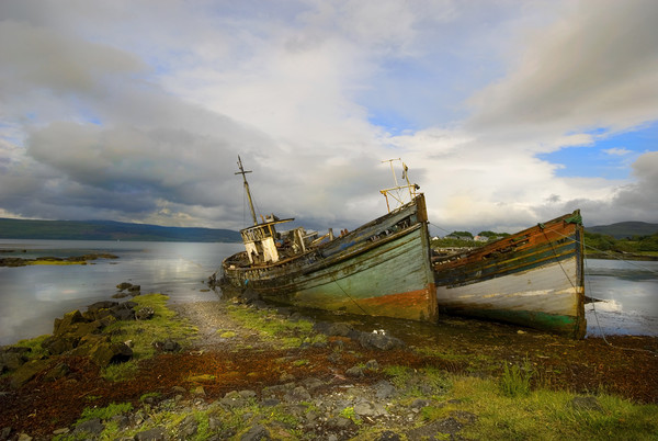 Fishing boats  abandoned Isle of Mull Picture Board by Eddie John