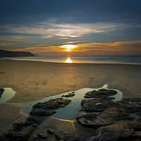 Buy canvas prints of Gorgeous sunset looking across perran beach at Per by Eddie John