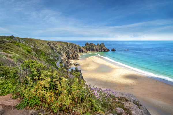 Porthcurno beach and Logans rock cornwall  Picture Board by Eddie John