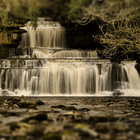 Buy canvas prints of Cotter Force Waterfall by John Hare