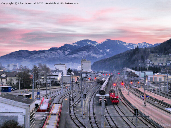 Sunrise over Feldkirch Station Austria.  Picture Board by Lilian Marshall