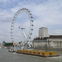Buy canvas prints of Heavy load on the River Thames. by Lilian Marshall