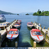 Buy canvas prints of Motorboats at Lake Windermere. by Lilian Marshall