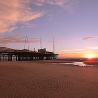 Buy canvas prints of  Sunset over South Pier.  by Lilian Marshall