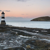 Buy canvas prints of  Penmon Lighthouse and Puffin Island. by Lilian Marshall