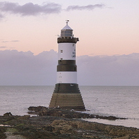 Buy canvas prints of  Penmon Point Lighthouse.   by Lilian Marshall