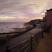 Buy canvas prints of Sunrise over Cromer Promenade.  by Lilian Marshall
