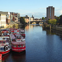Buy canvas prints of Pleasure boats moored at York.  by Lilian Marshall