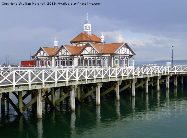 Grey skies over Dunoon Pier. Scotland. Picture Board by Lilian Marshall