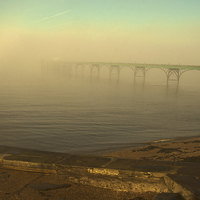 Buy canvas prints of  Clevedon Pier in fog. by John Morgan