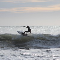 Buy canvas prints of  Surfer at Croyde Bay by Nicholas Ball