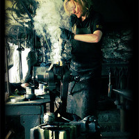 Buy canvas prints of Blacksmith at work by Maria Tzamtzi Photography