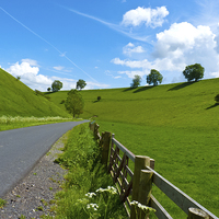 Buy canvas prints of  A road leading into a Yorkshire green valley. by Robert Gipson