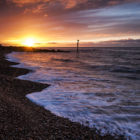 Buy canvas prints of  Ringstead sunrise  by Daniel Bristow
