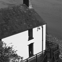 Buy canvas prints of The Boathouse at Laugharne Monochrome by Steve Purnell
