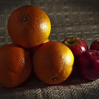 Buy canvas prints of Oranges and Apples by Steve Purnell