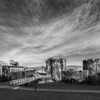 Buy canvas prints of Caerphilly Castle Panorama Mono by Steve Purnell