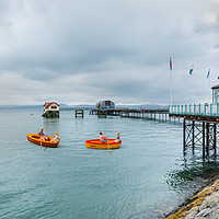 Buy canvas prints of Little Rowers At Mumbles Pier by Steve Purnell