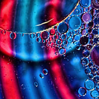 Buy canvas prints of Oil On Water 9 by Steve Purnell