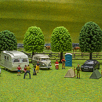 Buy canvas prints of At The Campsite by Steve Purnell