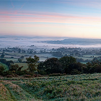 Buy canvas prints of Sunrise over the Blackmore vale by andrew bowkett