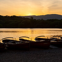 Buy canvas prints of Sunset Rowboats  by Roger Green