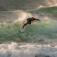 Buy canvas prints of Lanzarote Surfer by Roger Green