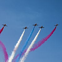 Buy canvas prints of Red Arrows by Roger Green