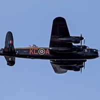 Buy canvas prints of Avro Lancaster Bomber by Roger Green