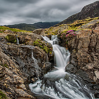 Buy canvas prints of Snowdonia Waterfall by Roger Green