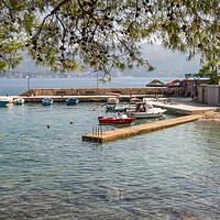 Buy canvas prints of Harbour on Koločep by Roger Green