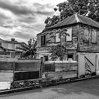 Buy canvas prints of Run Down House on St Kitts by Roger Green