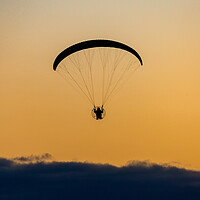 Buy canvas prints of Paramotor Sunset by Roger Green