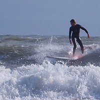 Buy canvas prints of Surfing at Langland Bay. by Becky Dix