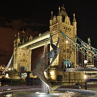 Buy canvas prints of Tower Bridge and Girl with a Dolphin Fountain. by Becky Dix