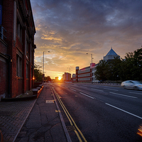 Buy canvas prints of Radiant Sunset Over Queen's Road by Rus Ki