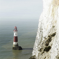 Buy canvas prints of Misty lighthouse by Richard Thomas