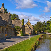 Buy canvas prints of Cotswold Village by Richard Thomas