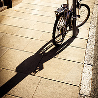 Buy canvas prints of Bicycle In Sunlight by Martyn Williams