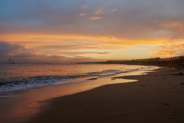 Sunset Over Newbiggin Bay Picture Board by John Ellis