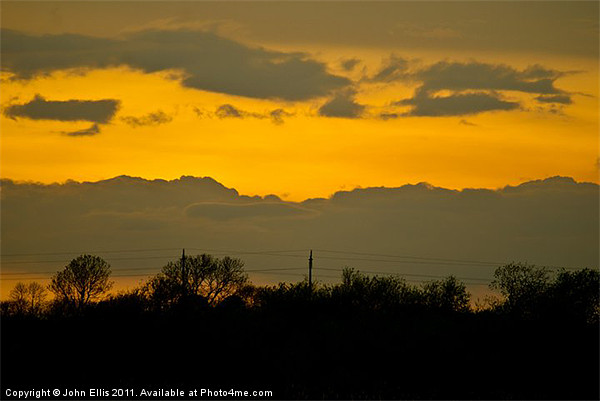 Sunset over Woolsington Picture Board by John Ellis