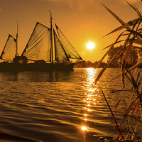 Buy canvas prints of  Sunset & Sails by John Ellis