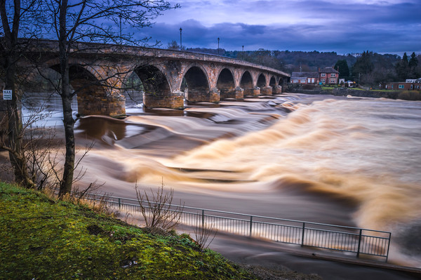 River Tyne in full Flood Picture Board by John Ellis