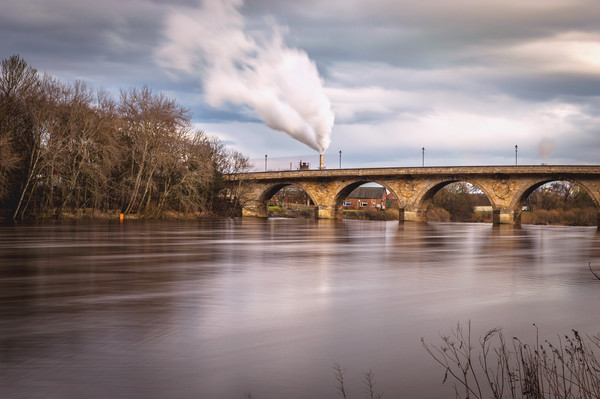 The River Tyne at Hexham Picture Board by John Ellis