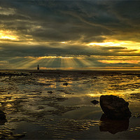 Buy canvas prints of Rays, Rocks and a Lighthouse by Aran Smithson