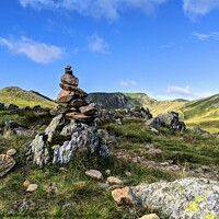 Buy canvas prints of Cairn leading the way by Aran Smithson