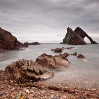 Buy canvas prints of Bow Fiddle Rock by John Barrie