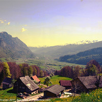 Buy canvas prints of Sleepy Swiss Village looking toward Vaduz by Russell Deaney